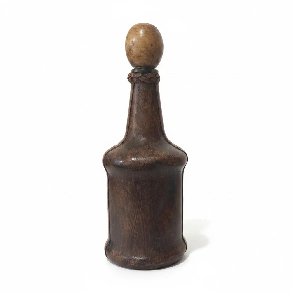 Vintage Leather Wrapped Decanter Bottle Embossed Coat of Arms Crest Wood Stopper